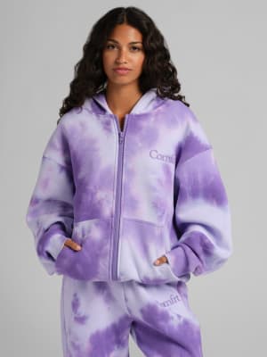 Minimalist Zip Hoodie: Elly is 5'8” and wears a size S