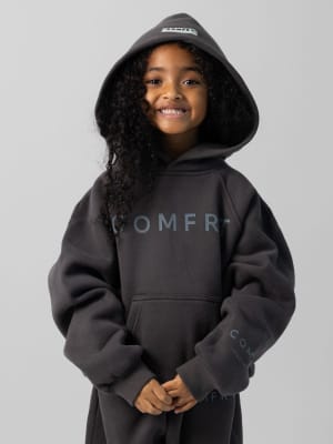 Tranquil Kids Hoodie: Malu is 5 wearing a size S