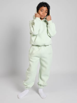 Pastel Kids Sweatpants: Carter is 9 wearing a size M