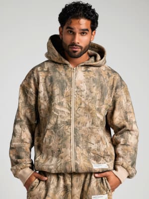 Camo Zip Hoodie: Jared is 6′1″ wearing a size M