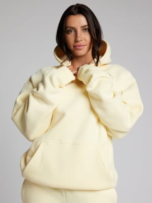 Minimalist Hoodie: Abby is 5′9″ wearing a size M
