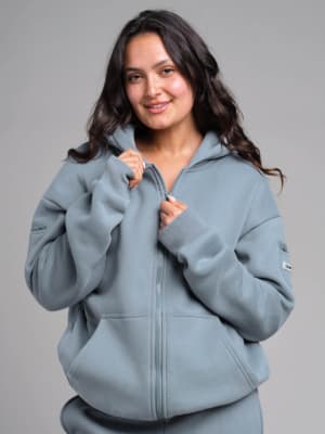Travel Essentials Zip Hoodie: Emily is 5'6" and wears a size S
