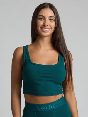 Rib Contour Crop Tank: Sara is 5'6" and wears a size M