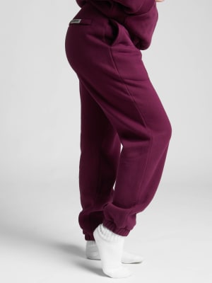 Travel Essentials Sweatpants: Sara is 5'6" and wears a size M