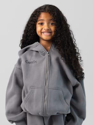 Cloud Zip Kids Hoodie: Malu is 5 wearing a size S